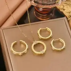 Necklace with earrings and ring studded with zircon in a ring design