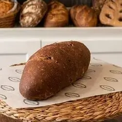 Brown batard sourdough with olives
