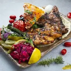 Half Grilled Boneless Chicken on Charcoal