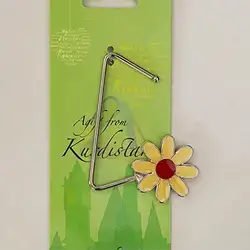 هەڵگری جانتا بە گوڵی نێرگز