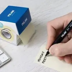 Mİlan sticky notes on a roll, pale yellow