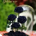 A glass bell containing a 4 Forever rose