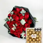 bouquet of red roses and a wrapped box of Ferrero Roshi chocolate