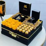 VIP BOX A large black square box that includes: chocolate, rose, and gifts