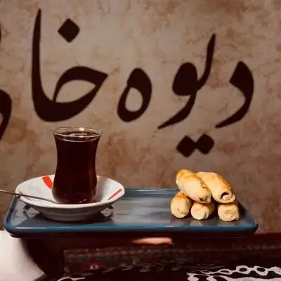Kleicha With Tea