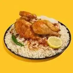 Half A Plate Of Chicken With Rice