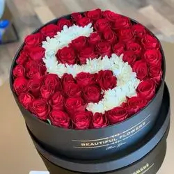 A Box Of Roses And Letters