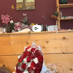 Red and White Oval Flower Arrangement