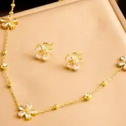 Necklace with bracelet and earrings in a floral design decorated with zircon