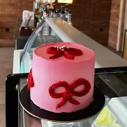 Pink Valentine's Cake with Ribbon Design