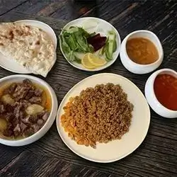 Qaliya with Pomegranate Molasses Rice