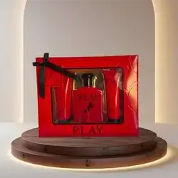 Play Red Perfume Set: A fragrance gift set including a main perfume bottle, shower gel, and body lotion.