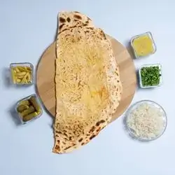 ناسکە نان بطاطا و بصل و جبن