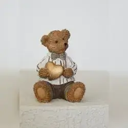 Sitting Brown Teddy Bear with Ball