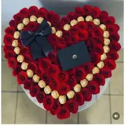 Heart Shaped Box Of Flower Designed With Tasty Chocolate