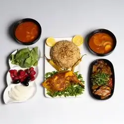 چارەگێك مریشك لەسەر برنج
