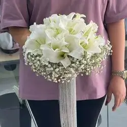 Bouquet Of Lily Flowers , Gypsophila And Crystal 