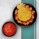 Rice And Gravy With Chicken Tikka