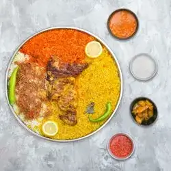 Half Madbhi Chicken on Gravel