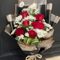 Red Rose With White Crise And Greens