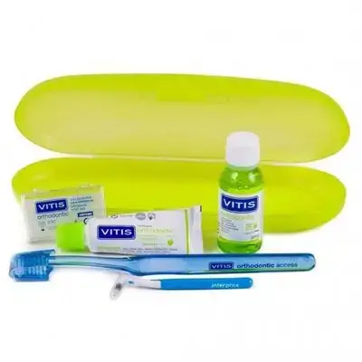 Dentaid Vitis Orthodontic Kit with wax (toothbrush, toothpaste, mouthwash, brush, and wax) in a case