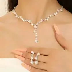 Rhinestone and faux pearl necklace with earrings