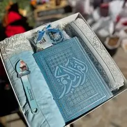 Quran set and prayer clothes