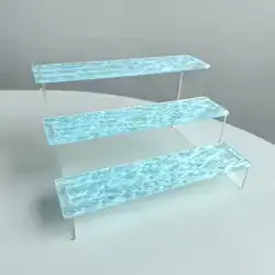 Transparent Acrylic Three-Tier Display Stand with a Wave Pattern Design