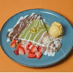 Mixed Crepe Filled With Various Chocolate Sauces Fruits & Cream As Available