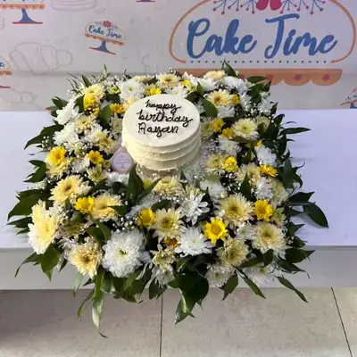 Cake And Yellow Dawdy Flower