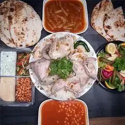 Whole Rooster on Rice