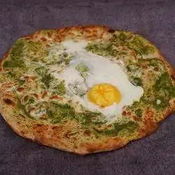 Qurad Bread With Cheese and Eggs