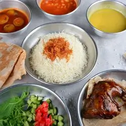 Rice And Chicken With Pomegranate Molasses