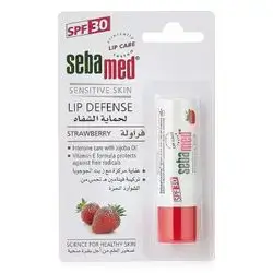 Sebamed Lip Defense balm features a strawberry