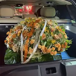 Orange Car Flower Arrangement