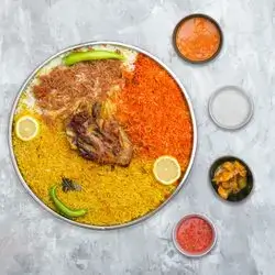 Madbhi Meat on gravel