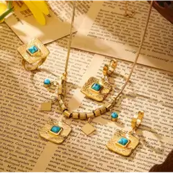 Necklace, Ring and Earrings Decorated With Turquoise Stones