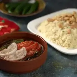 Meat In A Tray With Vegetables
