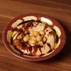 Hummus With Molasses Pomegranate (Musabbaha)