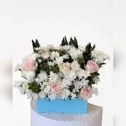 White Flower Arrangement in Blue Box