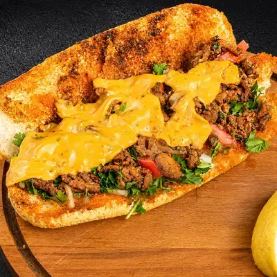 Meat Tantuni Sandwich in a Bun with Cheddar Cheese