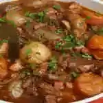 Meat With Onions, Tomatoes And Hummus And Biryani