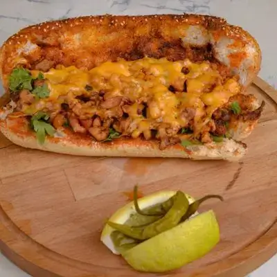 Chicken Tantuni Sandwich in a Bun with Cheddar Cheese