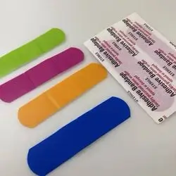 Colored first aid plaster packet
