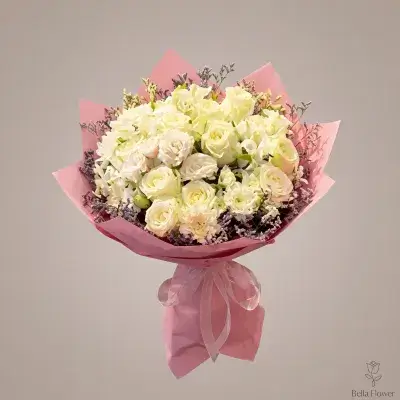 White Rose Bouquet in Pink Wrap
