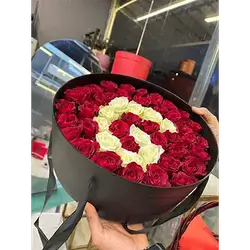 Black Box with Red and White Roses