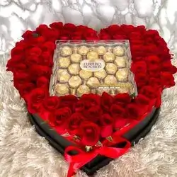 A Box Of Red Roses And Sweets