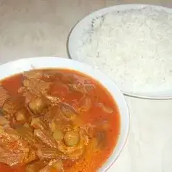 A Person Of Rice And Okra