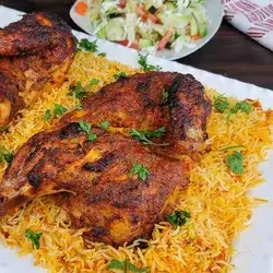 Half chicken on rice