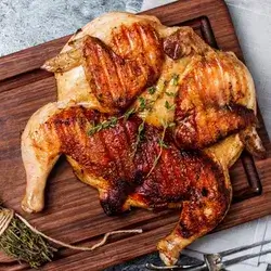 Half Grilled Coal Chicken With Bread And Salad